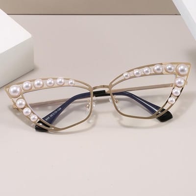 Lunettes de soleil œil de chat style européen américain pour femmes avec décoration perle Lunettes de soleil mode Nouvelle monture élégante