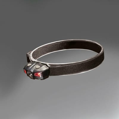 TIROSS Ultralichte LED hoofdlamp op AA-batterij met wit en rood waarschuwingslicht