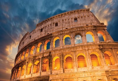 Fotobehang Colosseum City Sunset | XL - 208cm x 146cm | 130g/m2 Vlies