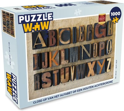 Puzzel Close-up van het alfabet op een houten achtergrond - Legpuzzel - Puzzel 1000 stukjes volwassenen
