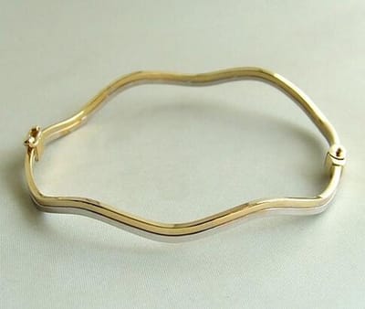 Gouden bicolor bangle golvend model