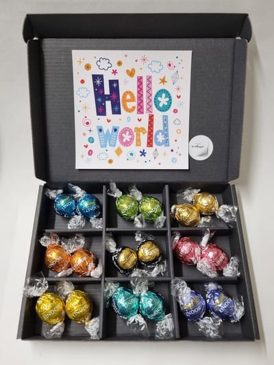 Chocolade Ballen Proeverij Pakket | Chocolade pakket met 9 verschillende chocolade smaken kwaliteits chocolade met Mystery Card 'Hello World' (met persoonlijke videoboodschap) | Cadeaupakket | Feestdagen box | Chocolade cadeau | Valentijnsdag