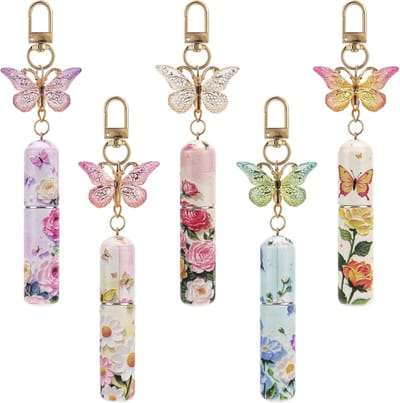 Daity Set van 5 reisparfumflesjes - navulbare draagbare sprayflesjes - met vlinder sleutelhangertje - lege mini-spraypomp van 5 ml (roze/rood/blauw/paars/geel)