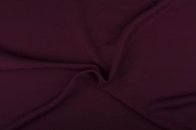 Texture/Polyester stof - Donker bordeaux - 25 meter