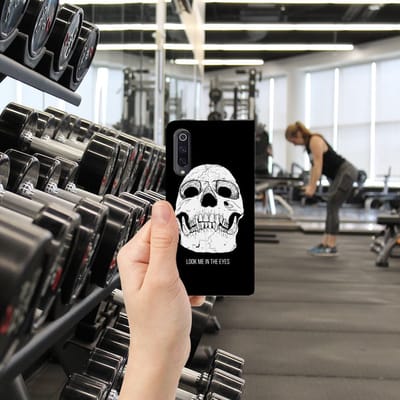 Mobiel BookCase Xiaomi Mi 9 Skull Eyes