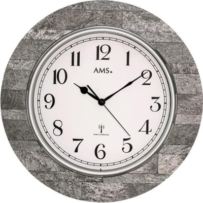 De AMS F5570 is een hoogwaardige draadloze wandklok met een diameter van 50 cm en een diepte van 5 cm. De ronde houten kast in antraciet geeft de wandklok een nobele, tijdloze uitstraling