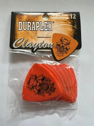 Clayton - Duraplex - rounded triangle plectrum - 0.60 mm - 12-pack