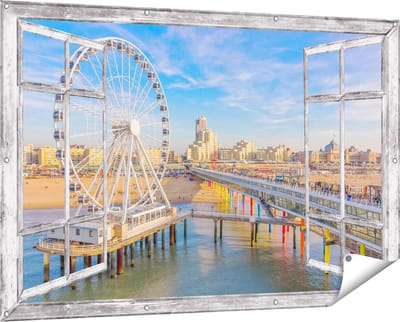Gards Tuinposter Doorkijk Scheveningen Pier met de Ferris Wheel - Reuzenrad - 150x100 cm - Tuindoek - Tuindecoratie - Wanddecoratie buiten - Tuinschilderij
