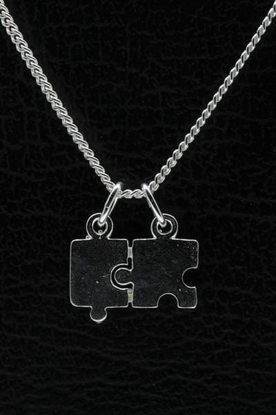 Zilveren Puzzelstuk ketting hanger - klein