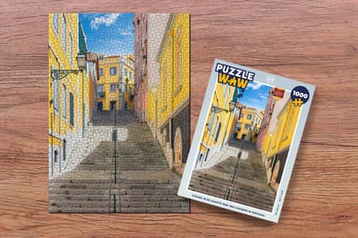 Puzzel Straat in de oudste wijk van Lissabon in Portugal - Legpuzzel - Puzzel 1000 stukjes volwassenen
