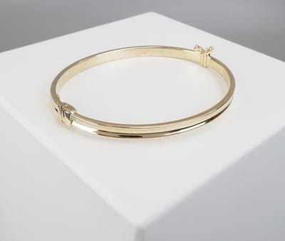 bangle Christian 14 karaat goud