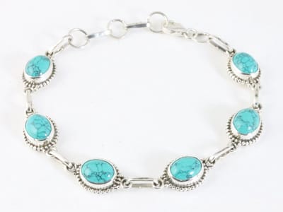Bewerkte zilveren armband met turkoois
