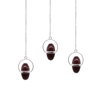 Shiva Lingam met bandpendel