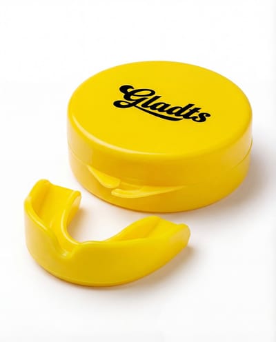 Gladts gebitsbeschermer - Geel - Kinderen - Junior - Gebitsprotecties - Makkelijk te vormen - Tandenknarsen - Bitje Vechtsport - Gebitsbeschermer - Mouthgard - Anti Snurk - Knarsbitje - Gebitsbeschermer Vechtsport - Tandenknarsen bitje