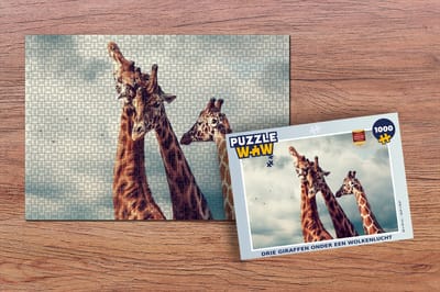 Puzzel Drie giraffen onder een wolkenlucht - Legpuzzel - Puzzel 1000 stukjes volwassenen