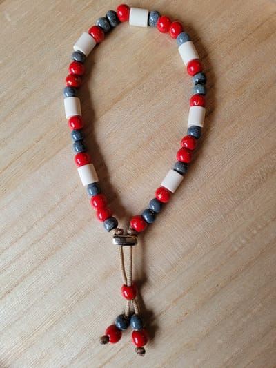 Anti Vlooienband / Tekenband EM-X Kralen 30-40cm ROOD (GEEN RECHT OP RETOUR)