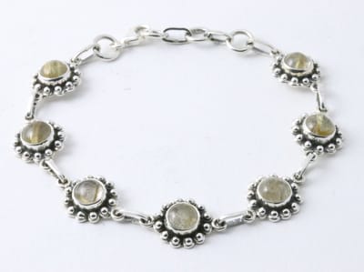 Bewerkte zilveren armband met gouden rutielkwarts