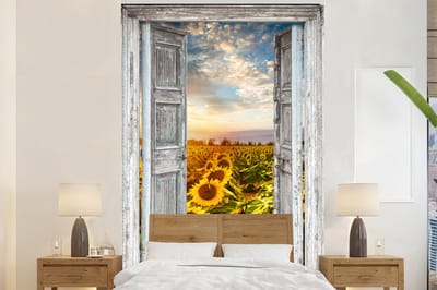 Behang - Fotobehang Doorkijk - Zonnebloem - Bloemen - Zon - Breedte 160 cm x hoogte 240 cm