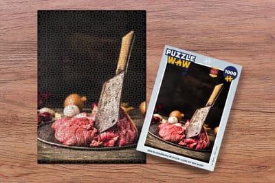 Puzzel Een slagersmes in rauw vlees op een bord - Legpuzzel - Puzzel 1000 stukjes volwassenen