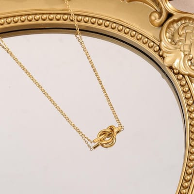 Niche veelzijdige geknoopte liefdeshanger ketting dames titanium staal sleutelbeen ketting sieraden