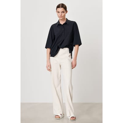 TRVL DRSS Arles Polo Top Black Maat: XS | Pantalons Outlet | Dames | Wit