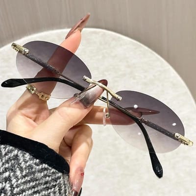 Lunettes de soleil ovales sans monture Pour pour Femmes Pour Hommes Vision Premium Style Rétro Rondes Lunettes de soleil Soleil Dames Élégantes Sans Limites UV400 1PC