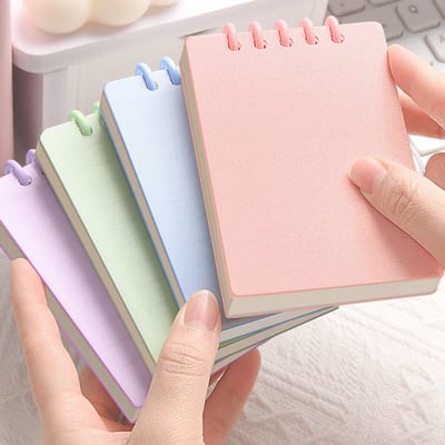 4-delige Klein notitieboekje - Notitieboek - Zaknotitieboekjes – Mini-spiraalboekjes - 10.3×7.3×1cm - Geschikt voor leraren, studenten, artsen, enz - Veelkleurig