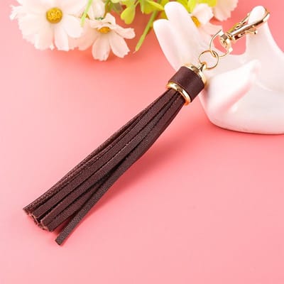 Porte-clés avec boucle en cuir et pompon en alliage de cuivre pour femme, accessoire de sac, tendance café