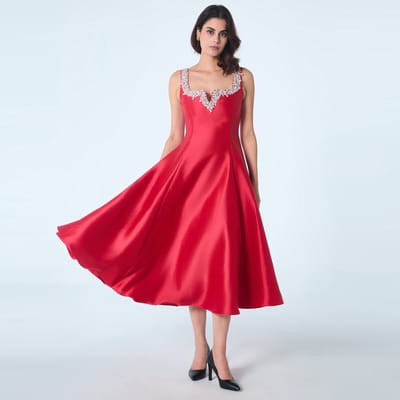 Cocktailjurk met hartvormig decolleté en kralen