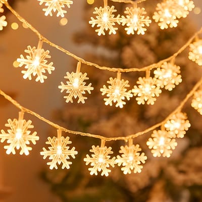 Aigostar LED Sneeuwvlok Lichtgordijn - 1,5 Meter - Warme Kerstverlichting voor Binnen & Buiten - Betoverende Kerstdecoratie - 8 Verlichtingsmodi - Warm Wit