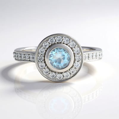 Cavill - Elegante Ronde Ring - 925 Sterling Zilver Geplatineerd - Hemelsblauwe Topaas 0,585 ct & Zirkonia 0,612 ct - Zilveren Sieraden Met Edelsteen