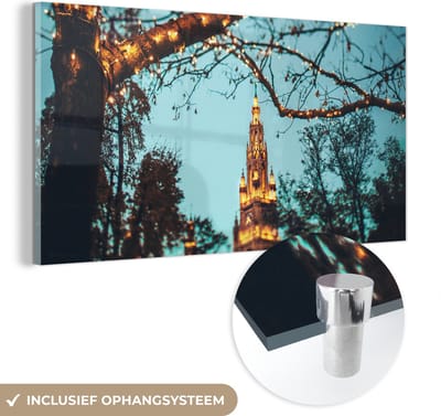 MuchoWow® Glasschilderij 120x60 cm - Schilderij acrylglas - Wenen - Kerstverlichting - Takken - Nacht - Duitsland - Foto op glas - Schilderijen