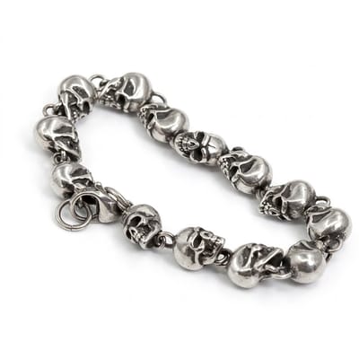 Zilverkleurige heren schakel armband met schedel schakels