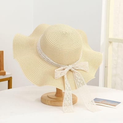Chapeau de soleil pour femme à protection UV, large bord, rubans nœud, chapeau de plage d'été, pliable, respirant, casquette en paille de voyage beige