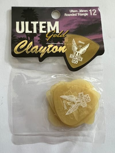 Clayton - Ultem Gold - Rounded Triangle plectrum - 0.38 mm - 12-pack