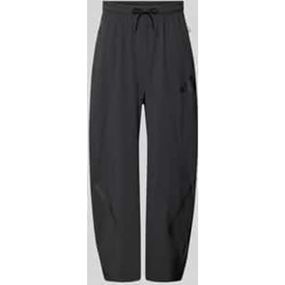 Oversized jogpants met ritszakken