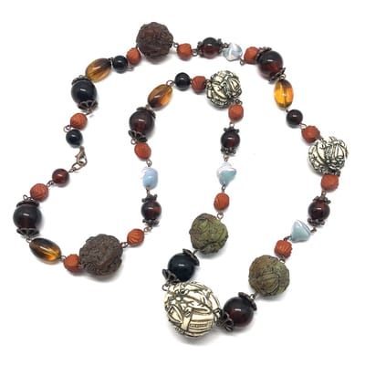 Behave Ketting - lange ketting - kralenketting - bruin - buddha kralen - boeddha motief - 90cm