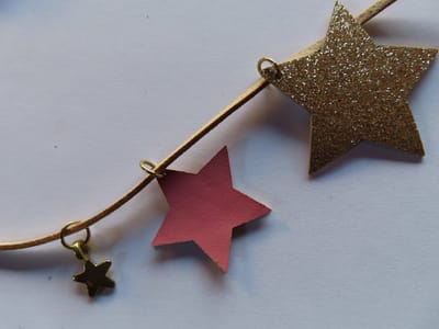 Noukie's - haarmode - Ketting , glitter ster - Roze /goud