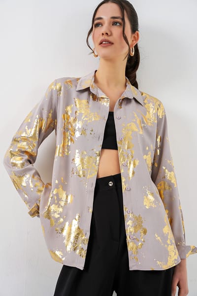 Oversized gestreepte blouse met knopen