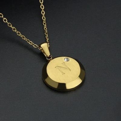 Aramat Jewels | Halskettingen | Goudkleurige Initiaal Ketting met Zirkonia Steentje - 45cm | N | |18mm | Staal | Volwassenen | Verkleurd niet