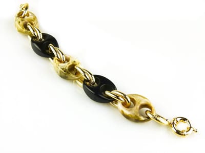 model St- Tropez armband in brons goudkleurige schakels en beige en zwarte resin