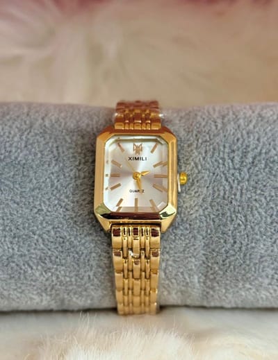 EHH Beauty - Goudkleurige dameshorloge - Goudkleur wit- Polshorloge - Horloge vrouwen - Sieradenzakje zwart