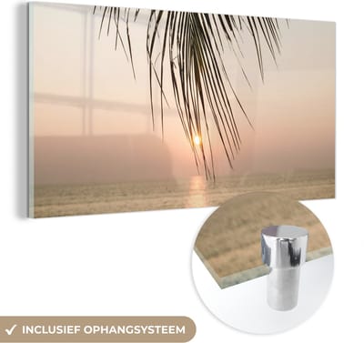 MuchoWow® Glasschilderij 120x60 cm - Schilderij acrylglas - Palmblad - Zon - Zomer - Strand - Foto op glas - Schilderijen