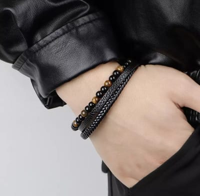 Leerella Armband dames en heren – dubbel snoer – Zwart gevlochten leer rond - zwart bruin tijgeroog steen - kralen - Leerella -zwart RVS sluiting - Model O - Valentijnsdag - Verjaardag - Cadeautjes