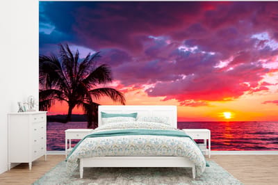 Behang - Fotobehang Zon - Horizon - Roze - Palmboom - Zee - Breedte 375 cm x hoogte 280 cm
