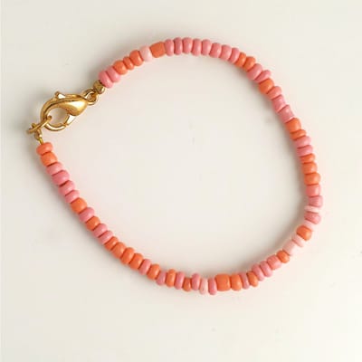 Armbandje voor de allerkleinsten - Roze/Oranje