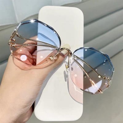Randloze Zonnebril Bril Dames Oceaan Water Cut Oogbescherming Dames Heren Geslepen Lens Duurzaam Metaal Metal Gebogen Tempels Zon Zonnebril Vrouwelijk UV400 with pouch and cloth