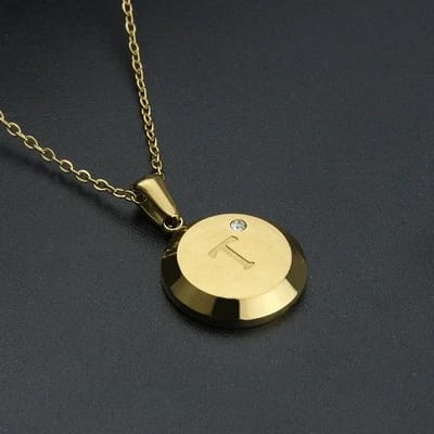 Aramat Jewels | Halskettingen | Goudkleurige Initiaal Ketting met Zirkonia Steentje - 45cm | T | |18mm | Staal | Volwassenen | Verkleurd niet