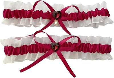 Trouwgarter van kant met rood strikje voor bruid
