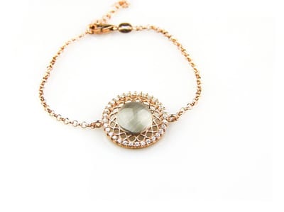 model Rondo armband in zilver roze verguld met tussenstuk lichtblauwe cabochon en cubic zirconia